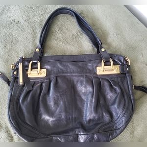very spacious B. Makowsky black leather purse